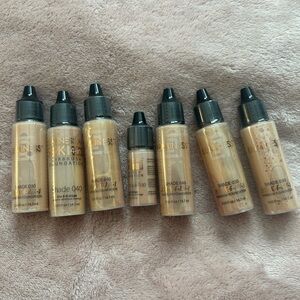 Milani Liquid Foundation Bottles in Warm Beige and Tan Shades